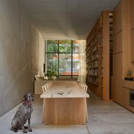Huge window opens to patios in matching Mexico City houses by PPAA