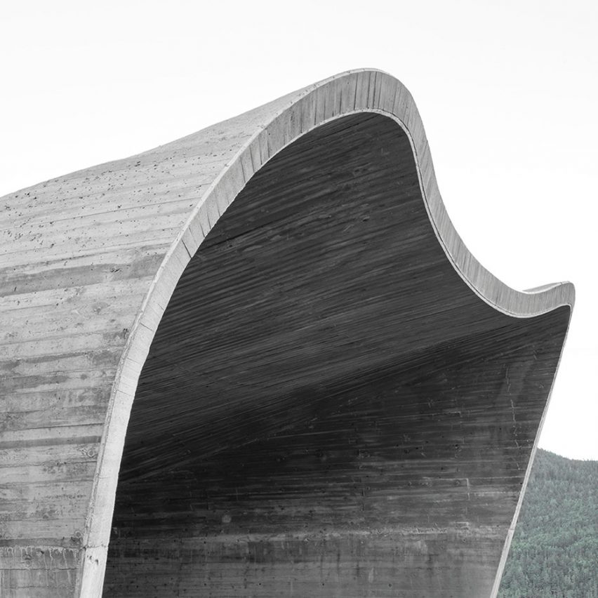 MoDus Architects builds curving concrete tunnel entrances in South Tyrol
