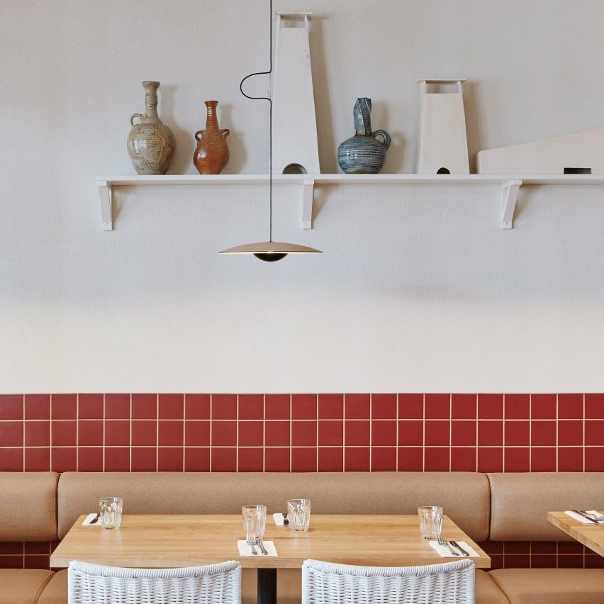 Burnt-red tiles and hessian feature inside Dough Pizza restaurant in Perth