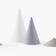 Nendo designs space helmet-shaped vessels and cascading tables for Zens