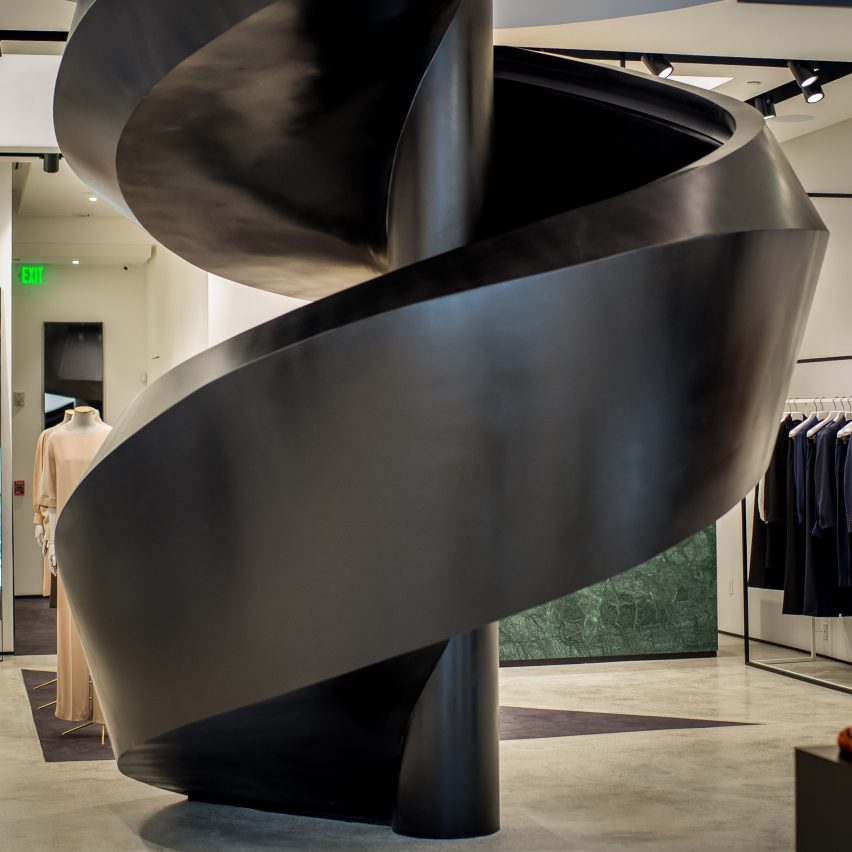 Black staircase twists up Joseph store in Miami Design District