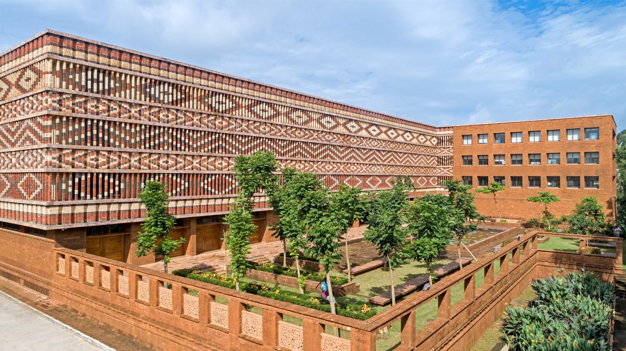 studio-lotus-creates-intricate-brickwork-facade-for-government-building