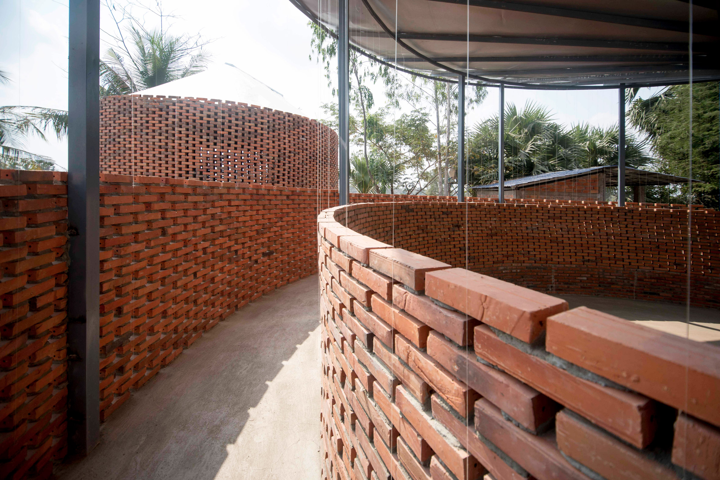Orient Occident Atelier builds community hall in Cambodia that harvests clean drinking water
