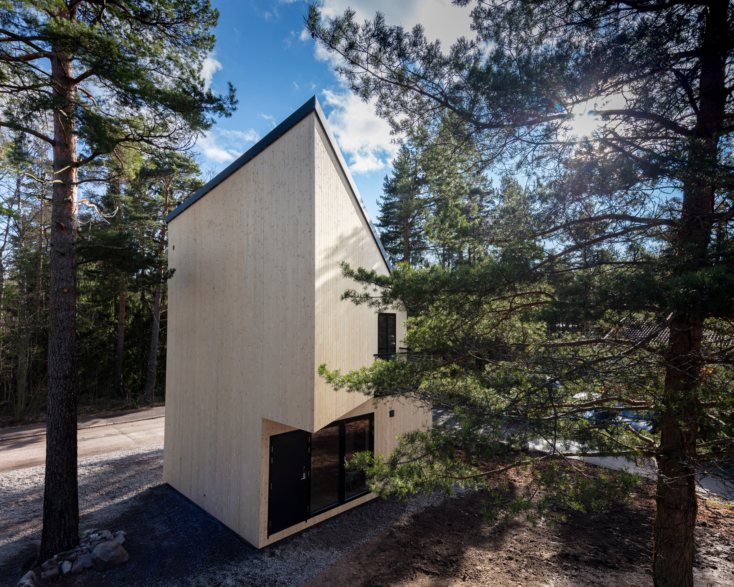 Ortraum Architects builds timber 12 studio beside house in Helsinki