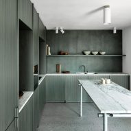 Apartment in Belgium features green kitchen