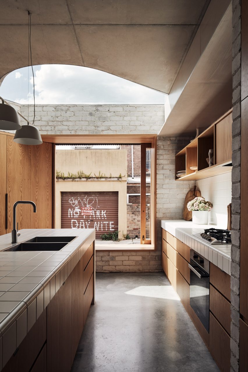 Industrial kitchen at Bismarck House by Andrew Burgess Architects in Bondi, Sydney