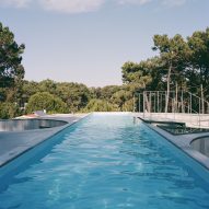 Double O Studio tops trefoil-shaped concrete house with rooftop pool