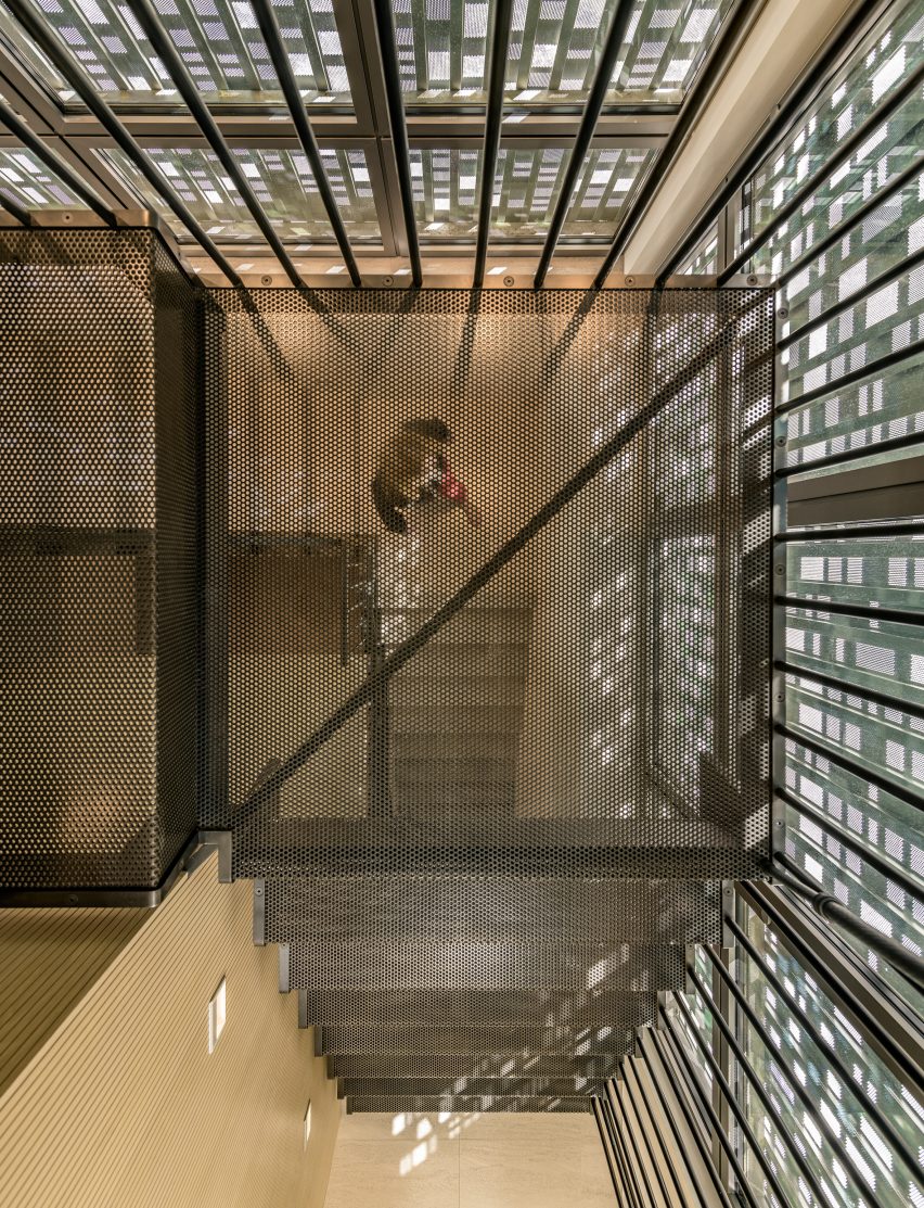 Steel mesh staircase in Music Box by CCY Architects