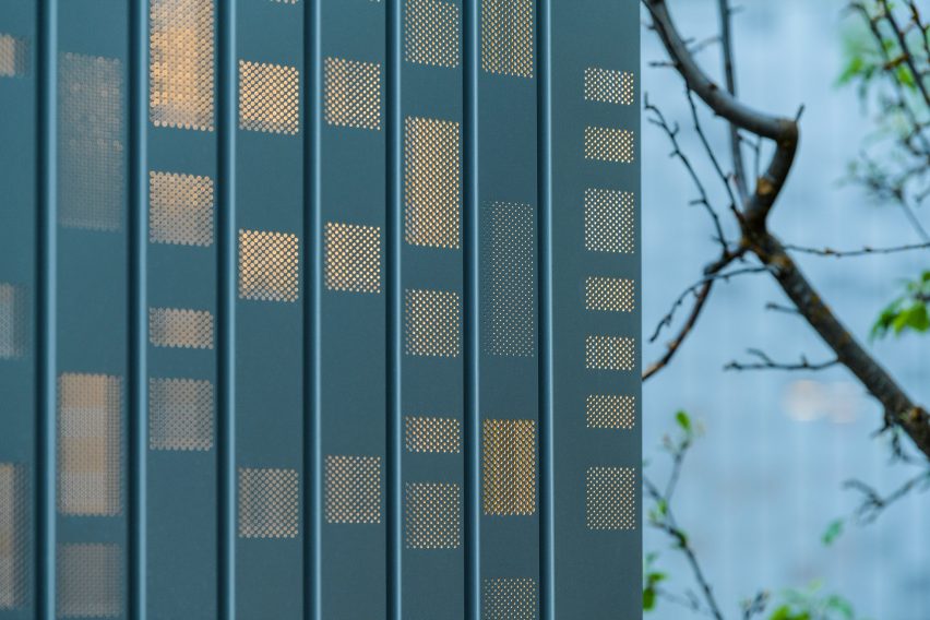 Perforated metal facade Music Box by CCY Architects