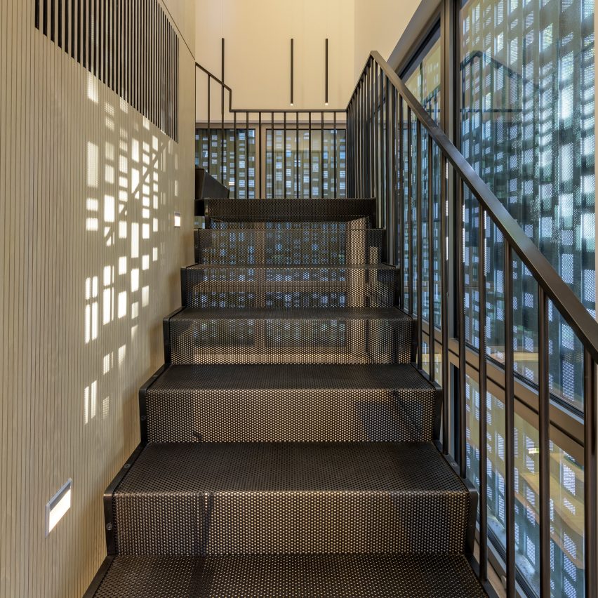 Steel mesh staircase in Music Box by CCY Architects