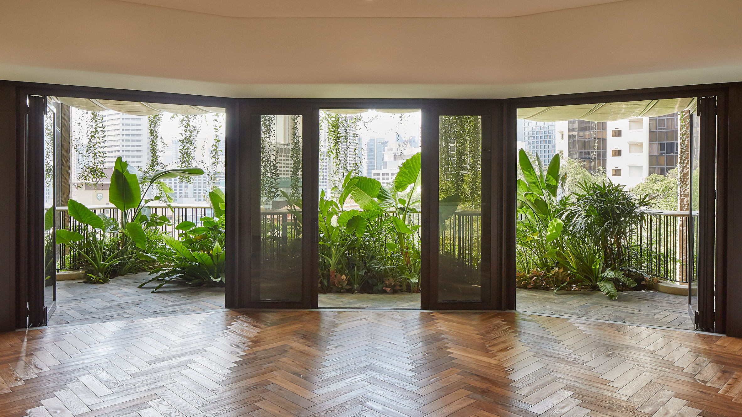 Living space at EDEN skyscraper in Singapore by Heatherwick Studio