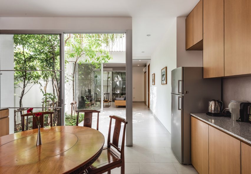 Kitchen and internal courtyard of the Forest House by Shma Company