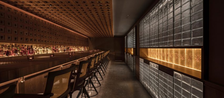Beetles cover the walls and ceiling of the J Boroski bar in Shanghai by Atelier XY