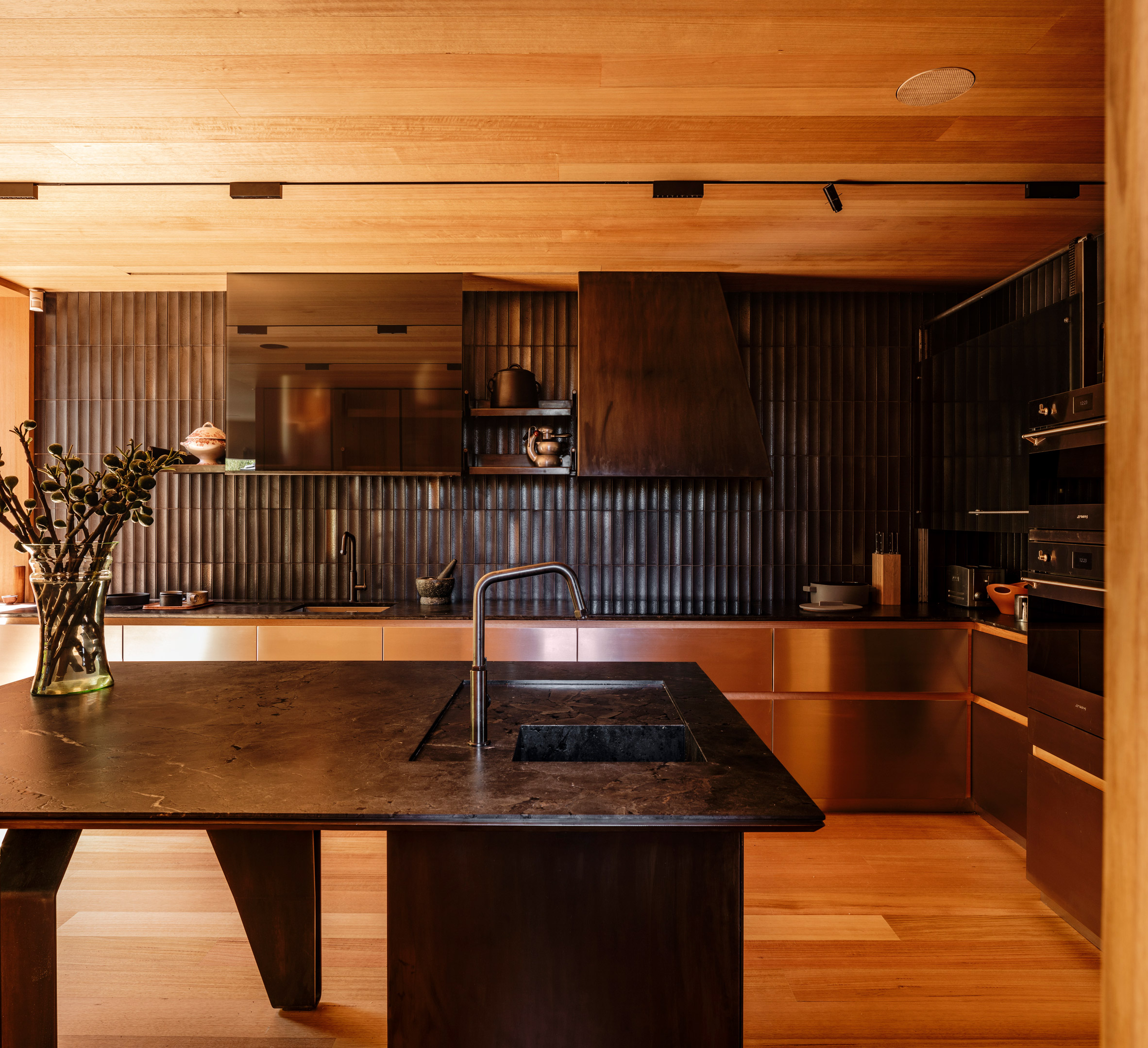 Kitchen with Japanese tiles in Kew Residence by John Wardle Architects in Melbourne, Australia