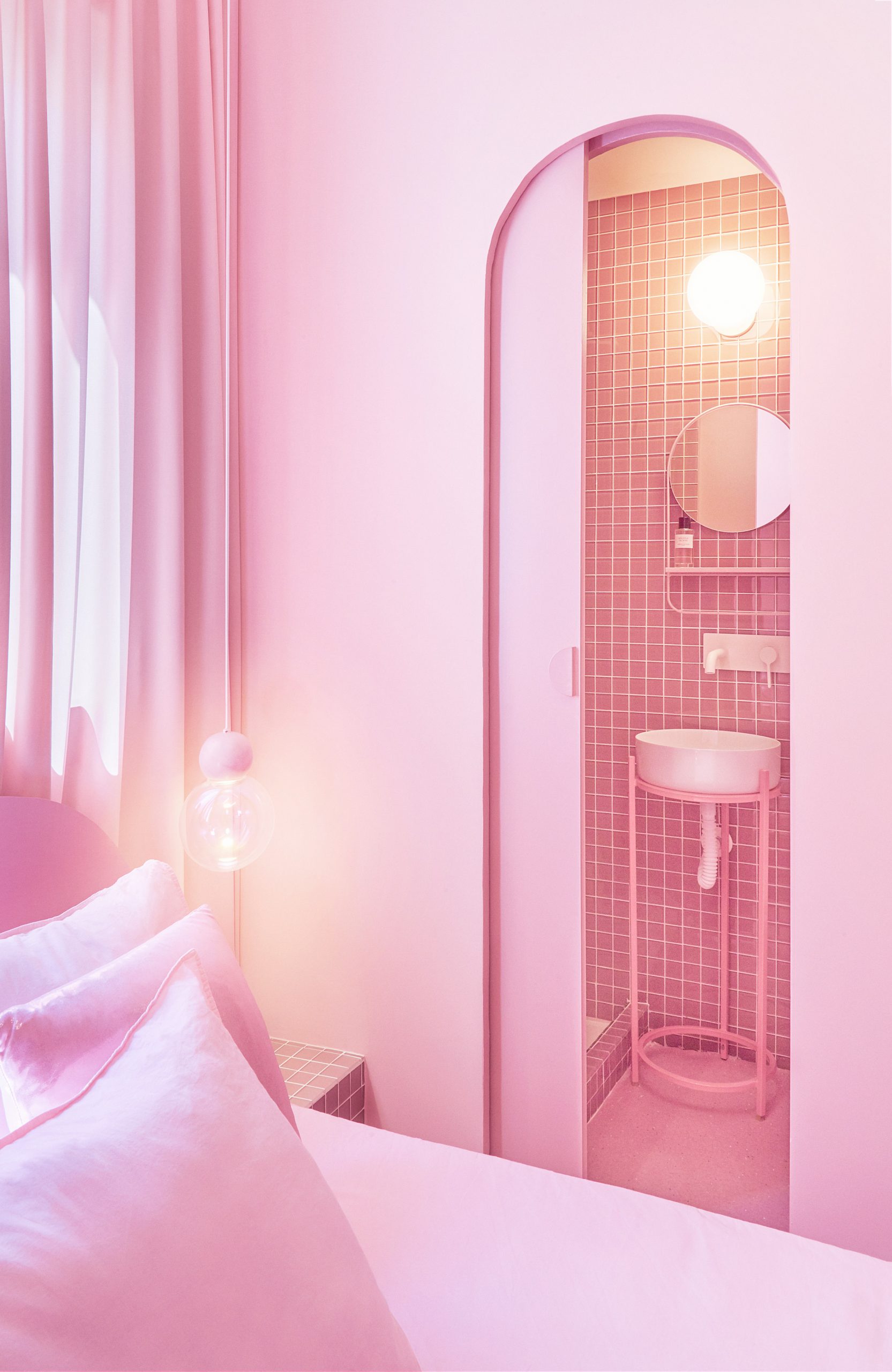 Minimal Fantasy holiday apartment in Madrid is almost completely pink