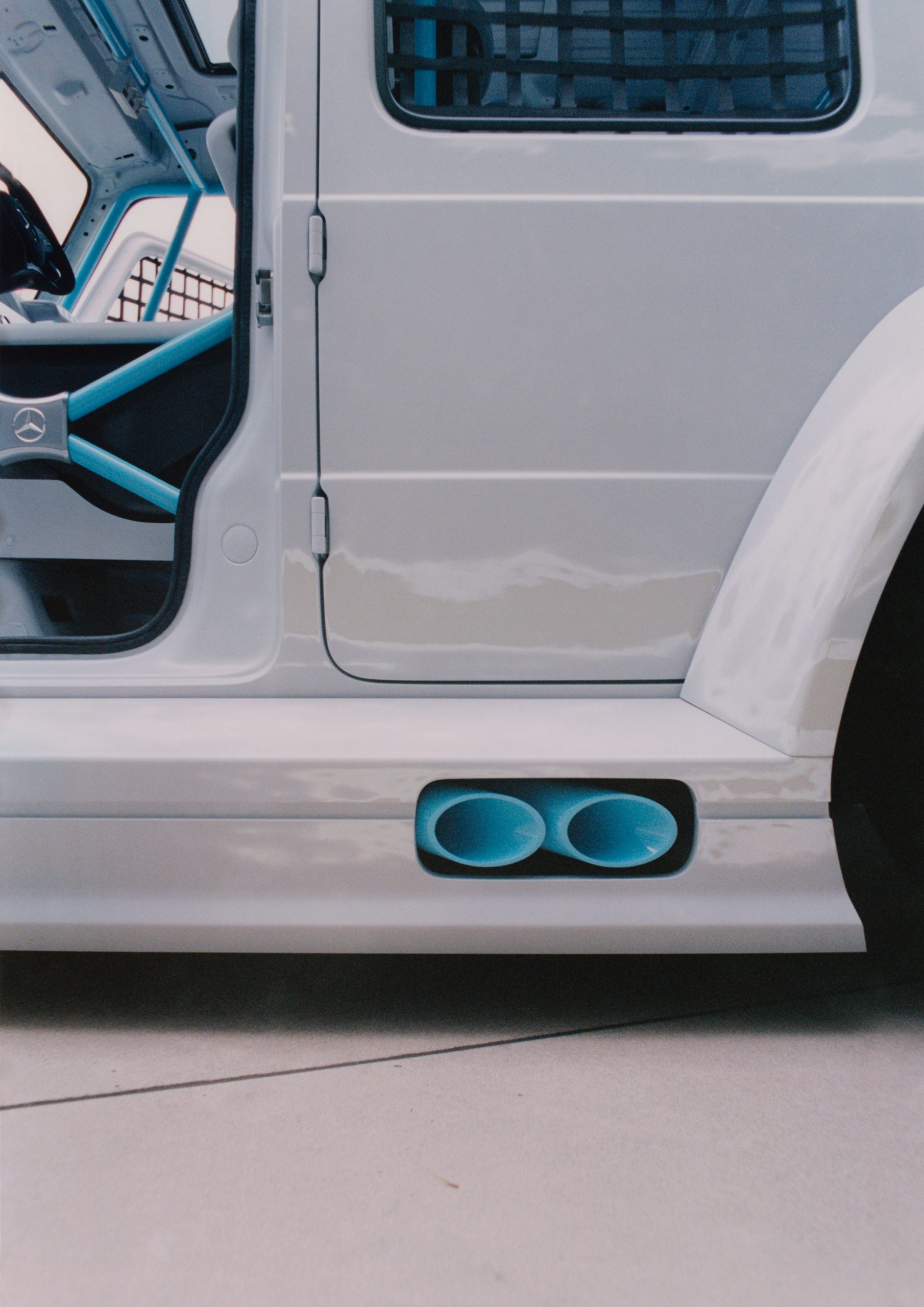 Blue exhaust pipes in Project Geländewagen car by Virgil Abloh and Mercedes Benz