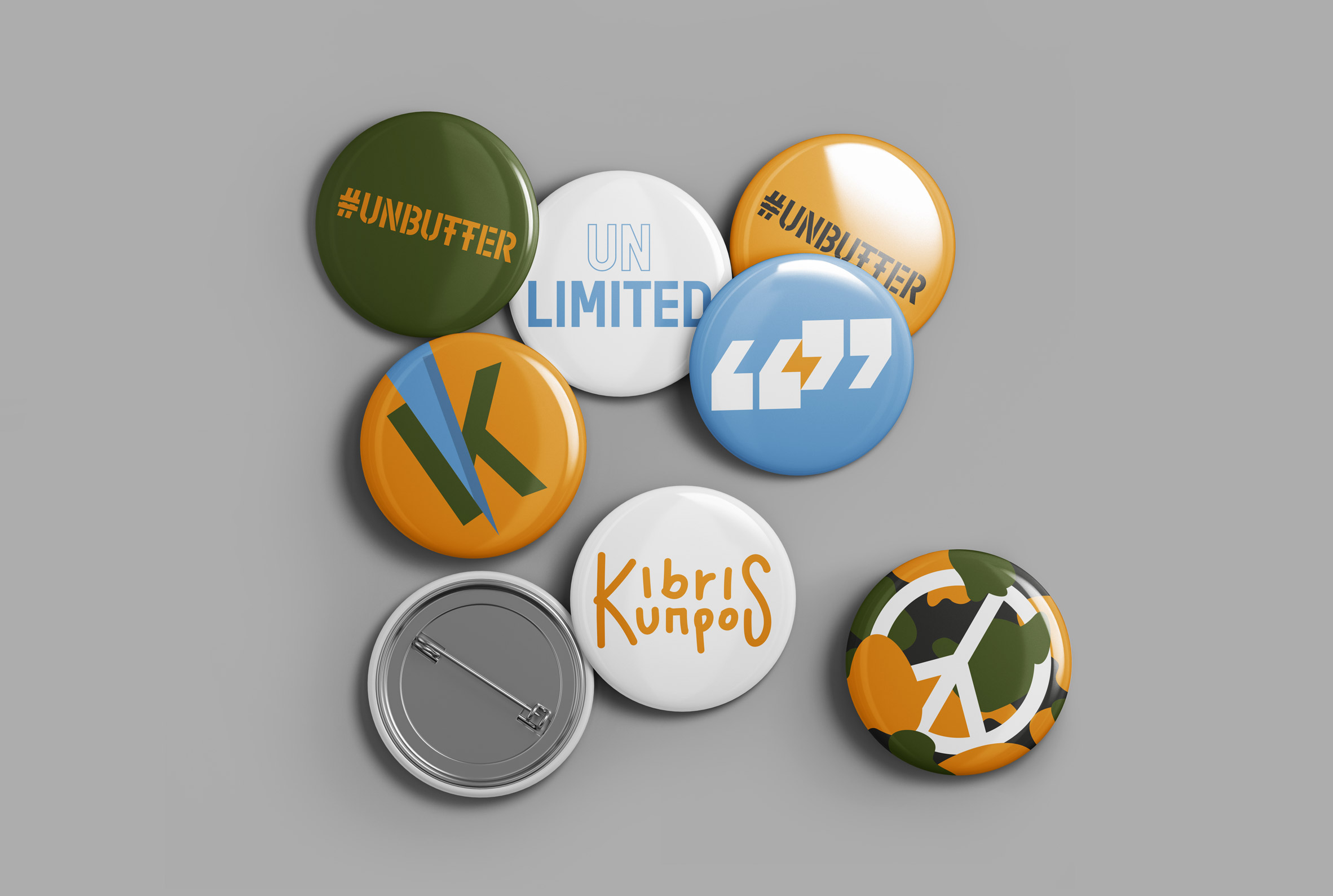 Pin badges from UNbuffer, a graphic design postcard project by Alexandros Kosmidis