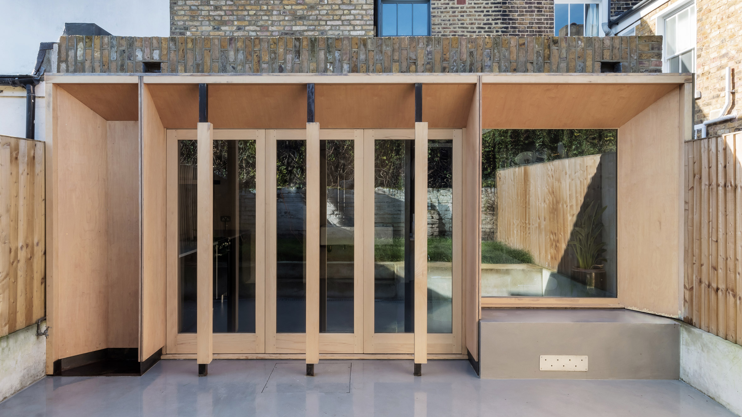 timber facade of Untiled House extension by Szczepaniak Astridge in London
