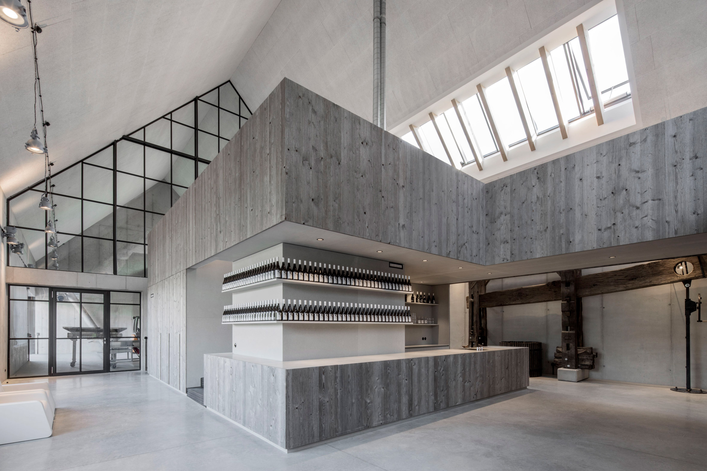 Clemens Strobl winery by Destilat features greyscale interiors