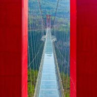 World's longest glass-bottomed bridge in Huangchuan Three Gorges Scenic Area in southern China