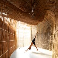 Rattan yoga pods create "space of captivating calmness" for studio in Bangkok