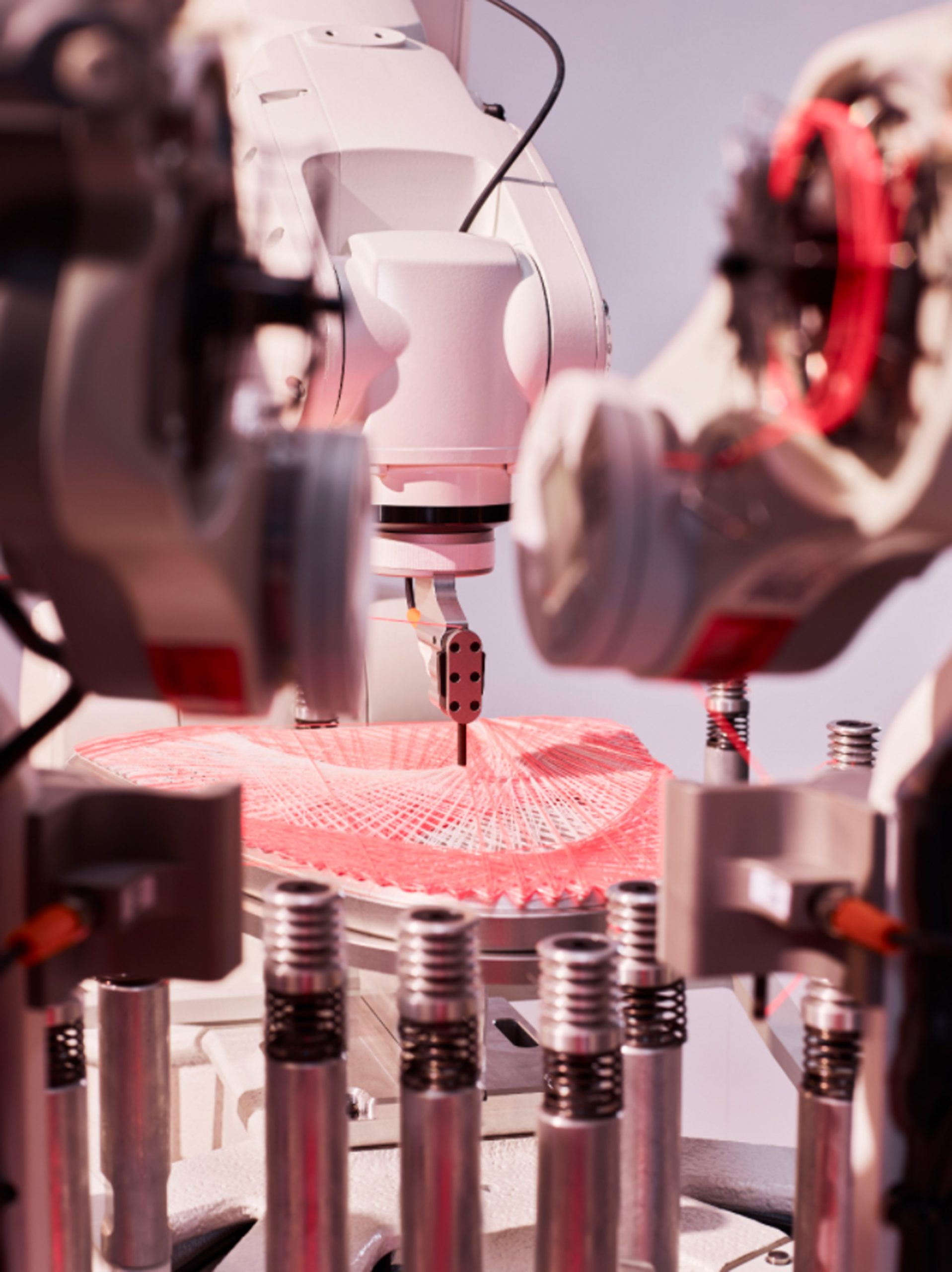 Robot weaving Adidas's Strung uppers