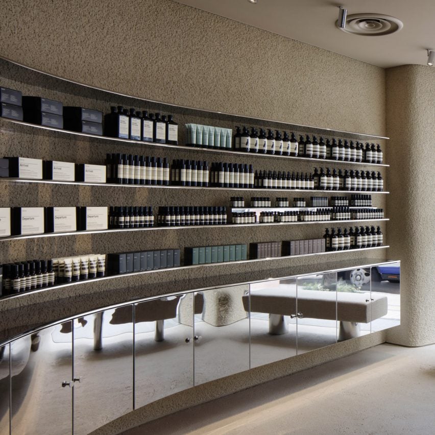 Case-Real contrasts plaster and steel inside Aesop store in Shinjuku