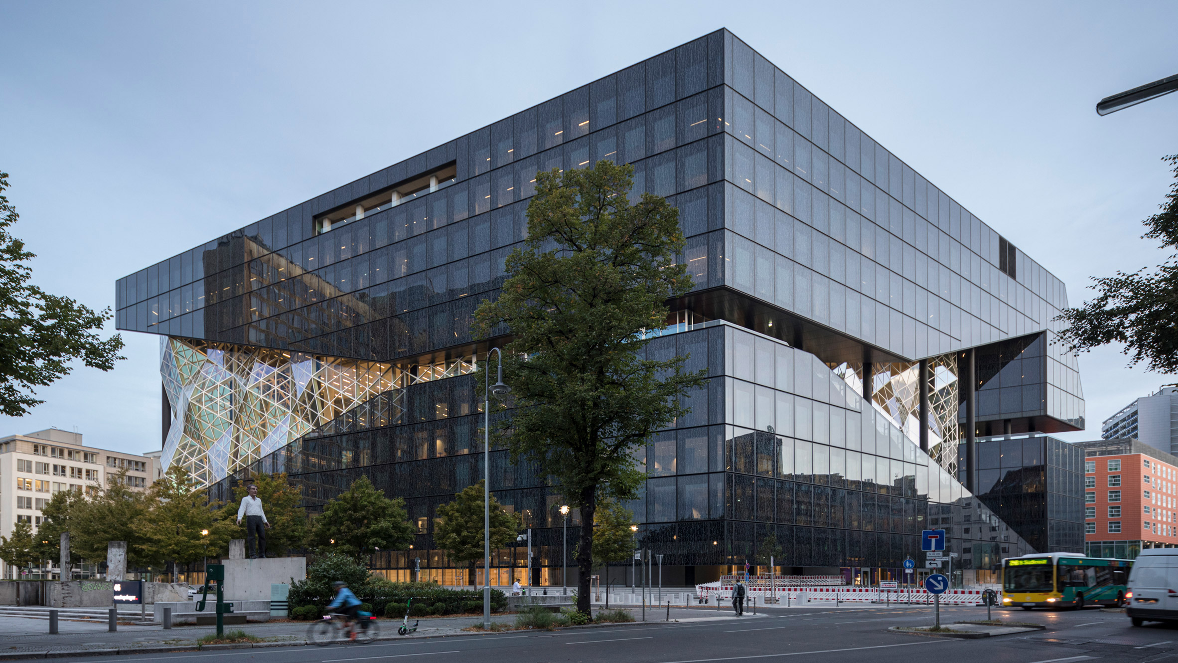 Faceted glass atrium bisects OMA's Axel Springer building in Berlin