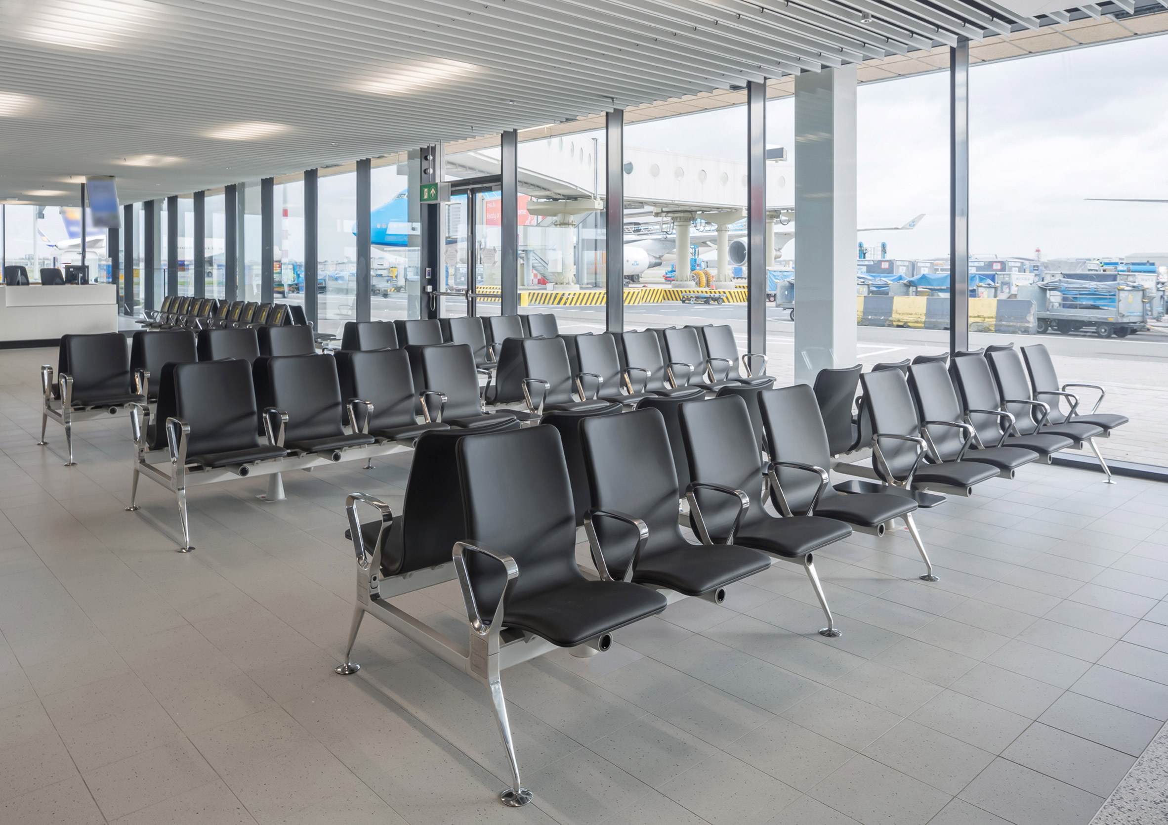 Richard Hutten melts down Schiphol airport's old chairs for new Blink seating system with Lensvelt