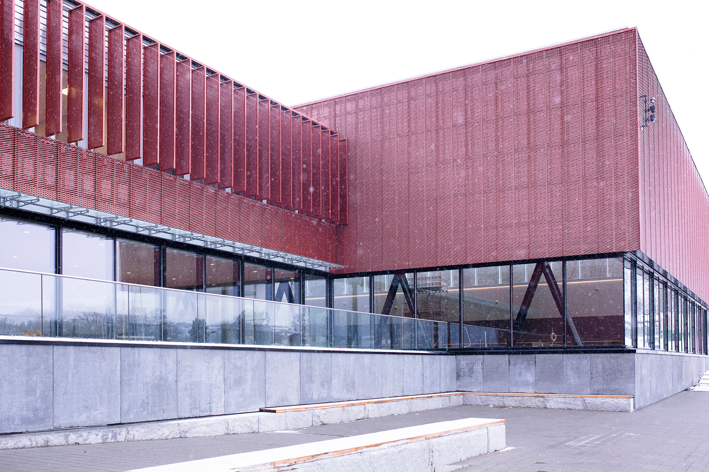 Perforated metal facade of Bølgen Bath and Leisure Centre by White Arkitekter