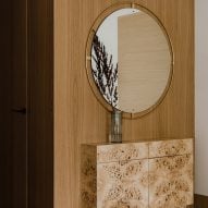 Botaniczna Apartment by Agnieszka Owsiany Studio includes burl wood furniture