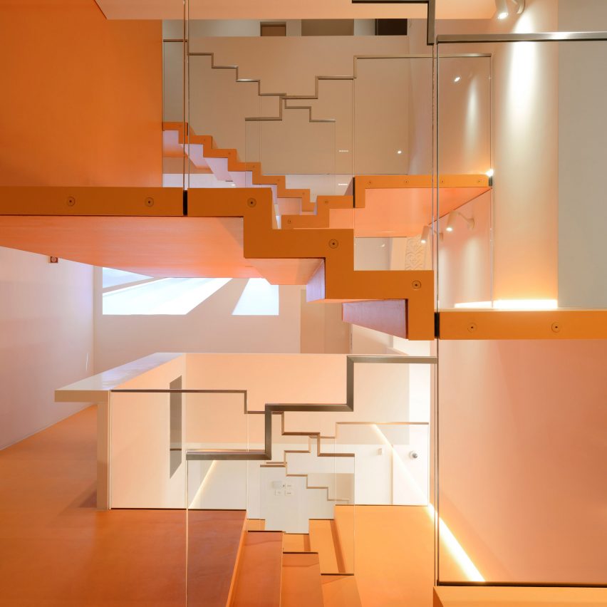 Carlo Ratti unveils digital arts centre with zigzag orange staircase