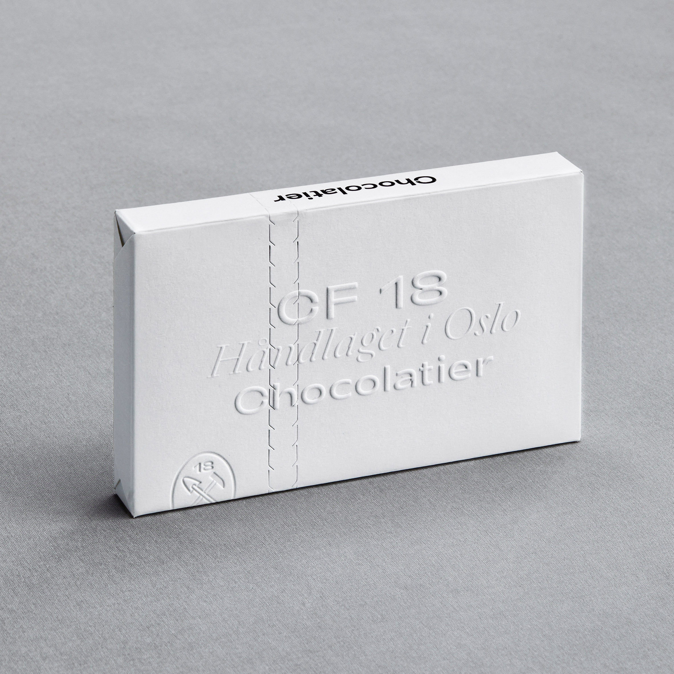 OlssønBarbieri cuts out plastic in minimalist CF18 Chocolatier packaging