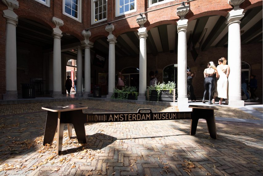 Corona Crisis Kruk, a social distancing bench by Object Studio, displayed outside a museum