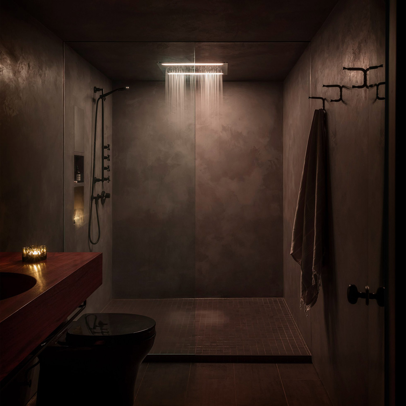 Dark bathroom inside Western Studio, USA, by GoCstudio