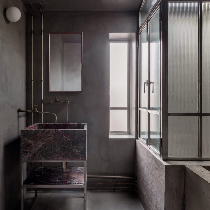 Dark bathroom inside Untitled House, UK, by Szczepaniak Astridge