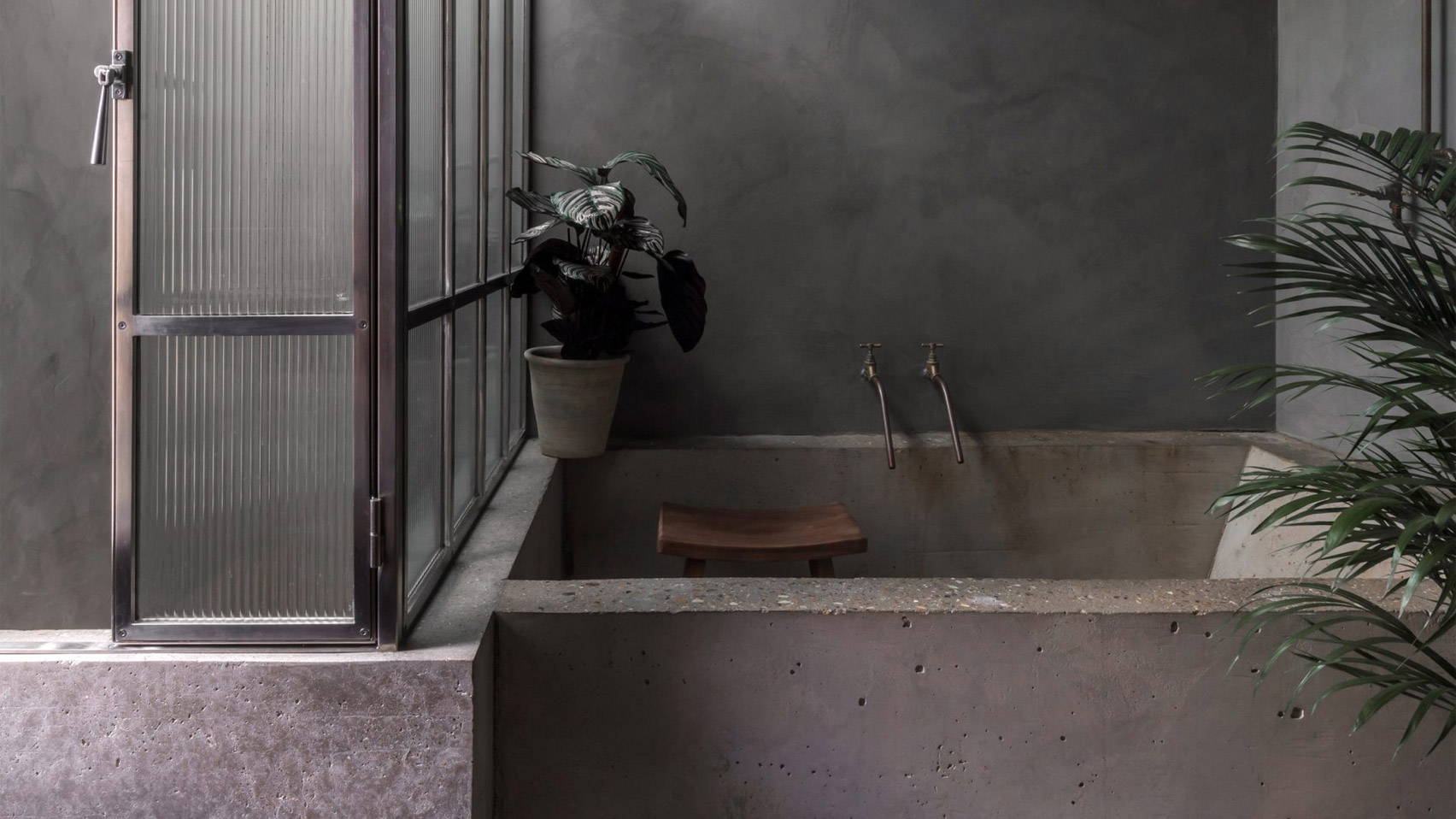 Dark bathroom inside Bathroom of Untitled House, UK, by Szczepaniak Astridge