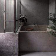 Ten tranquil bathrooms with dark and soothing interiors