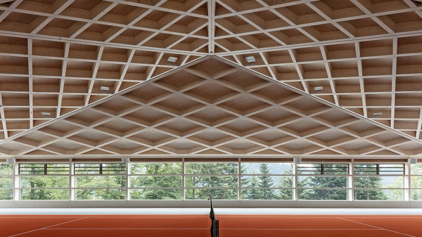 View from Diamond Domes tennis courts designed by RÃ¼ssli Architekten with CLT roofs by Neue Holzbau in the Swiss Alps