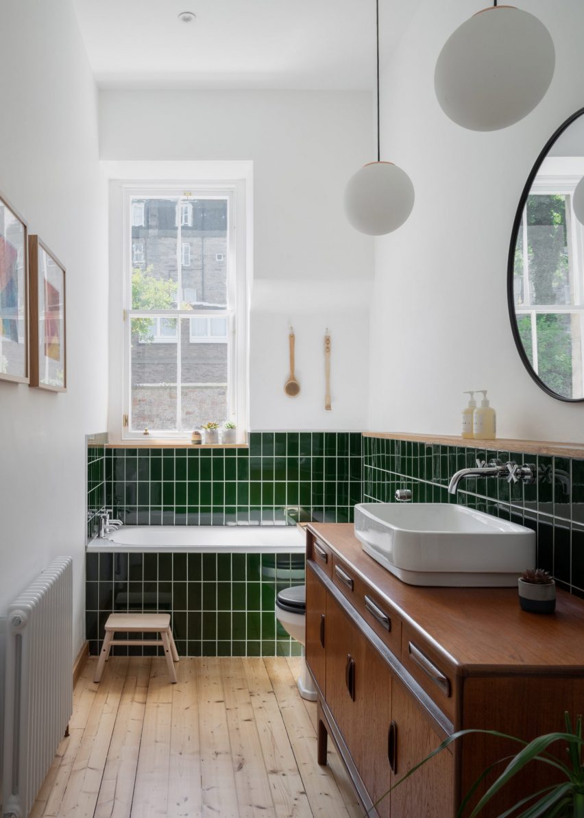 Bathroom with green tiles