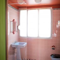 Tiled bathrooms inside Hotel Les Deux Gares in Paris