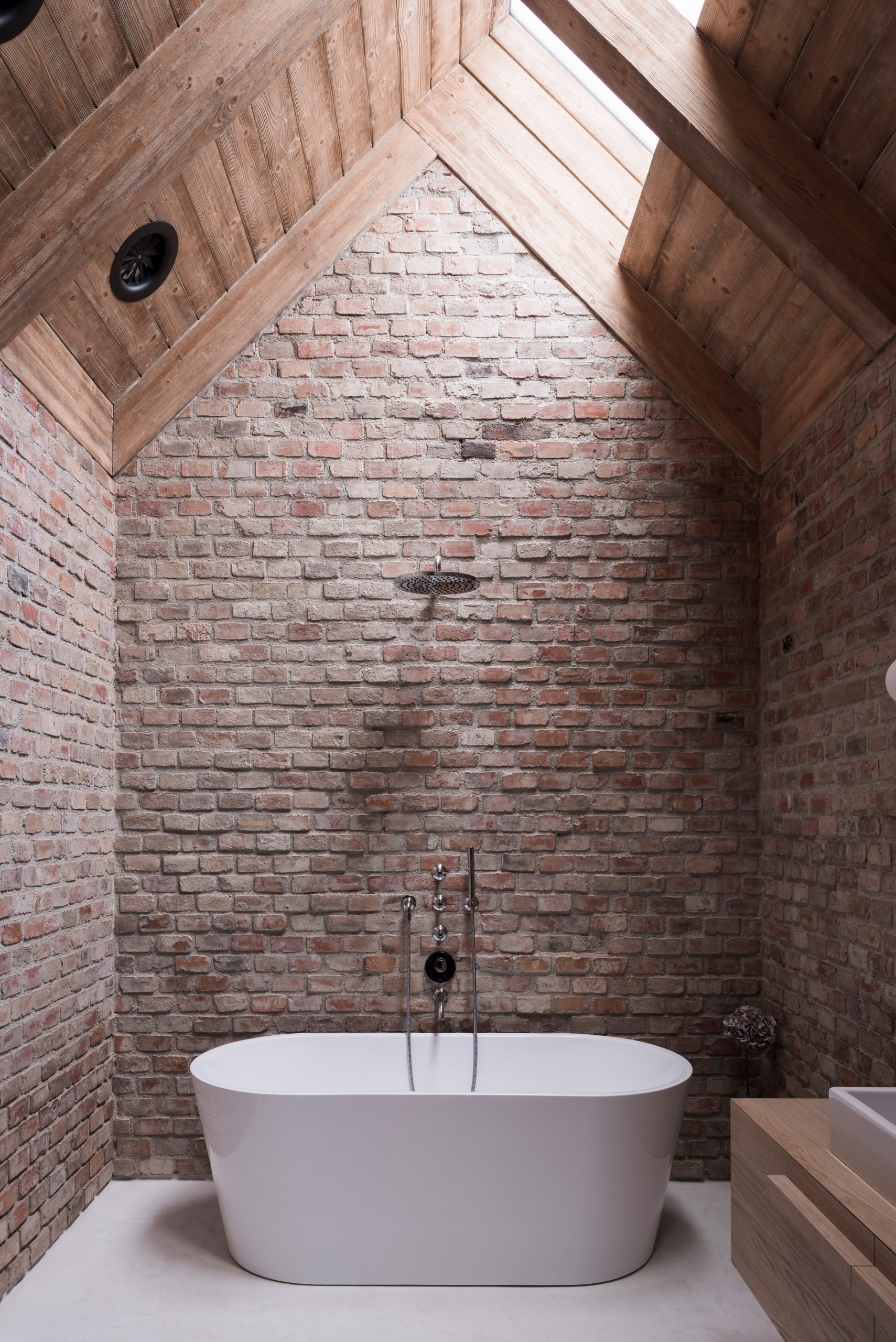Exposed-brick bathroom
