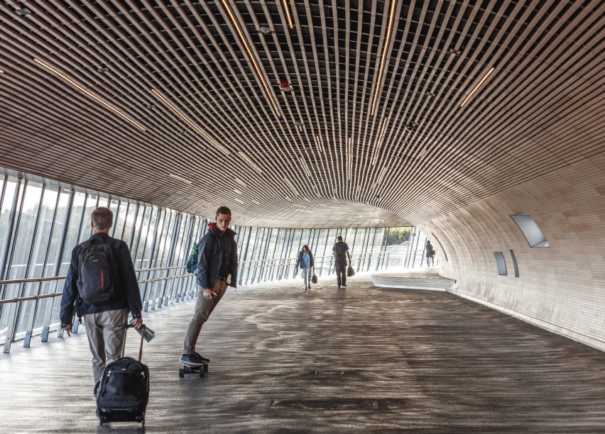 Oakwood-clad interior of Køge Nord Station by Cobe and Dissing+Weitling