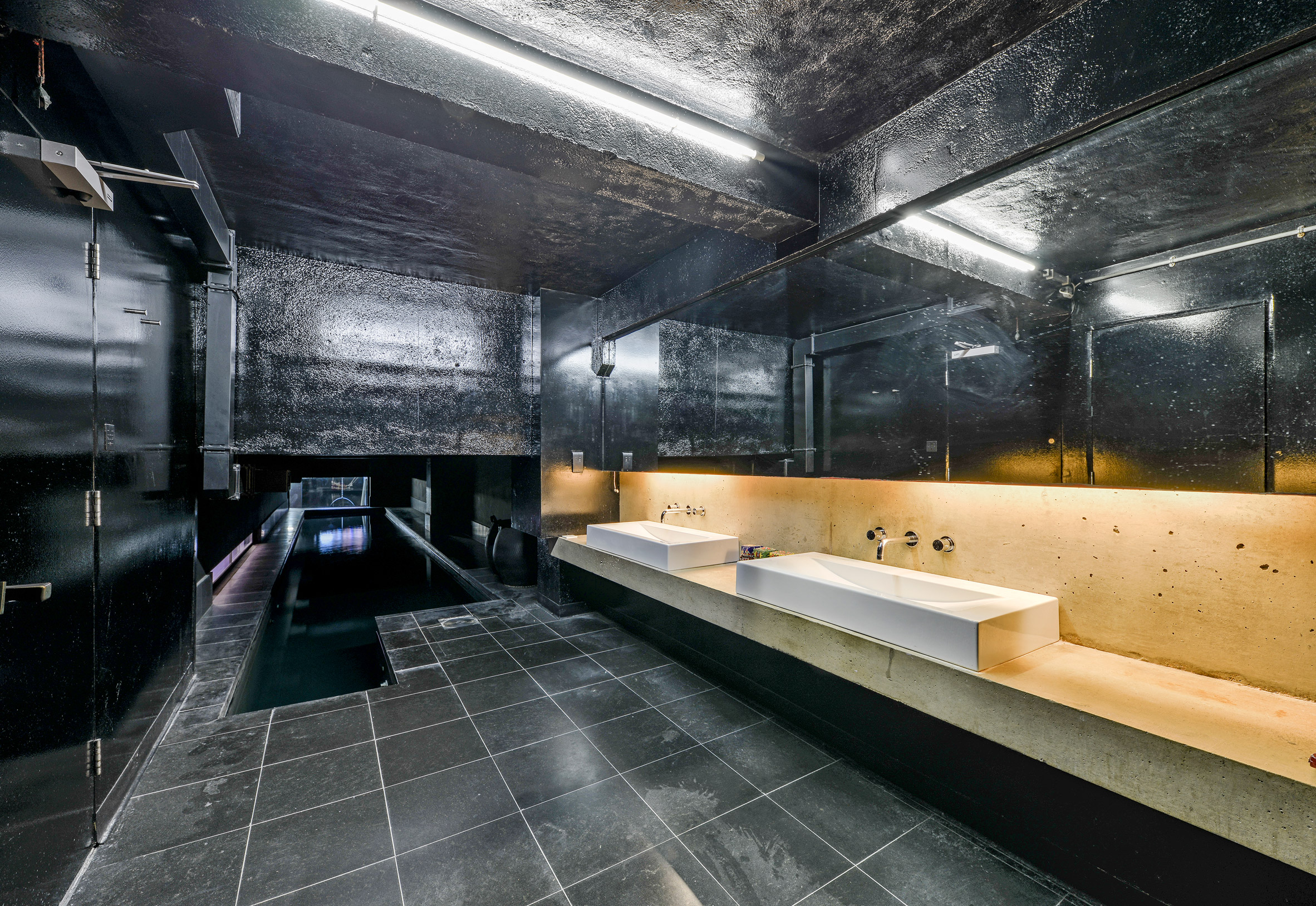 Sinks and pool of Interiors of Lost House by David Adjaye