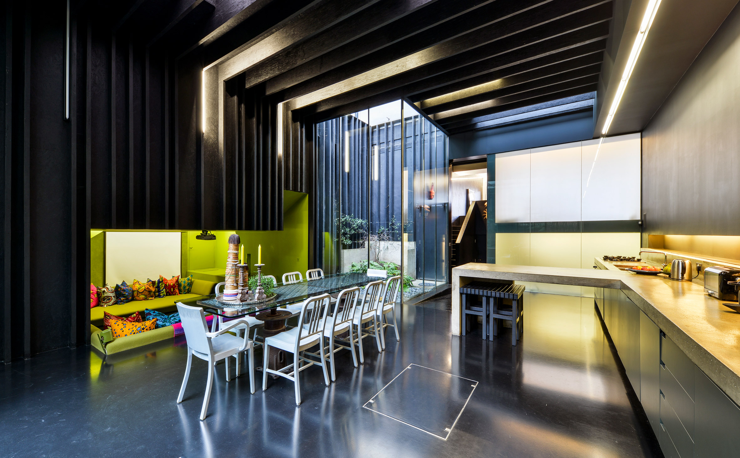 Kitchen with concrete counter tops in Lost House by David Adjaye