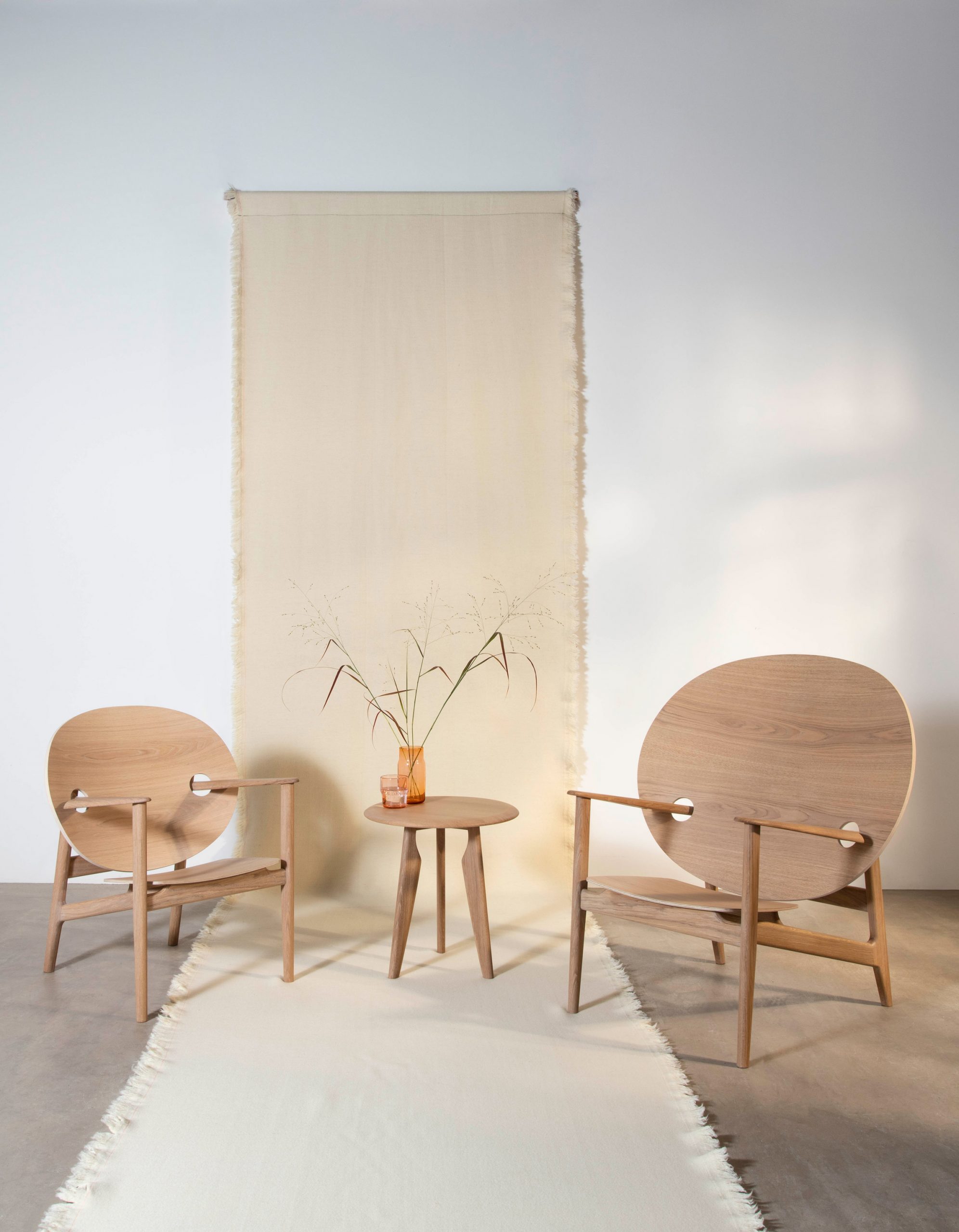 Mac Collins' Iklwa chairs and table in white oil