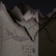 Lin Shaobin emulates mountainous scenes with burnt paper for Chinese tea packaging