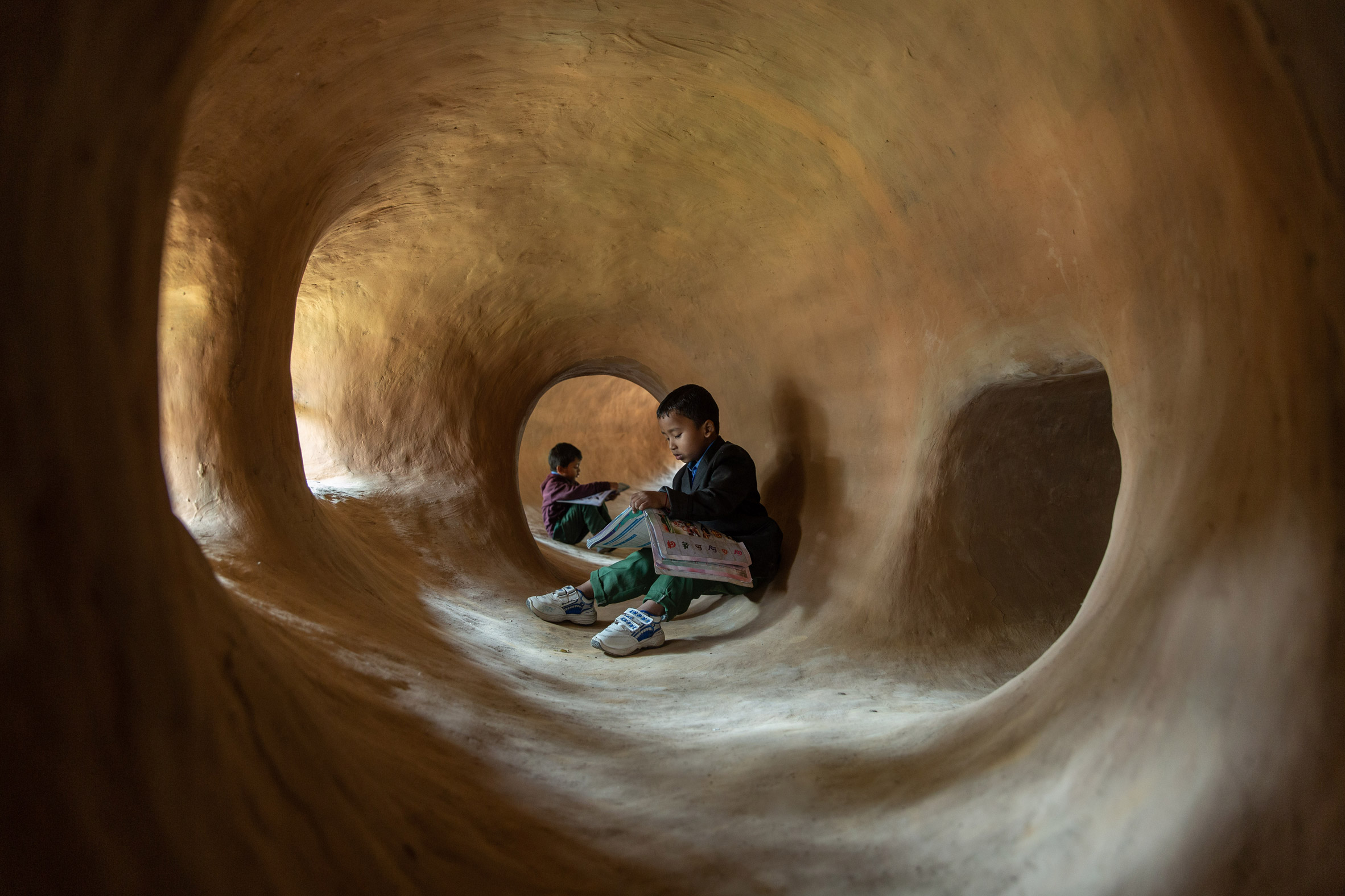 Rammed-earth cave-like structure