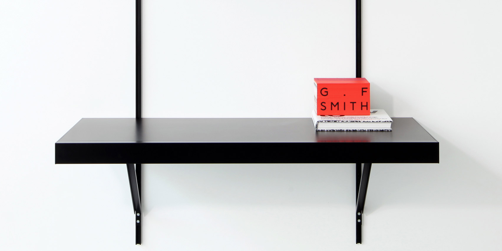 ON&ON's shelving system with a desk unit