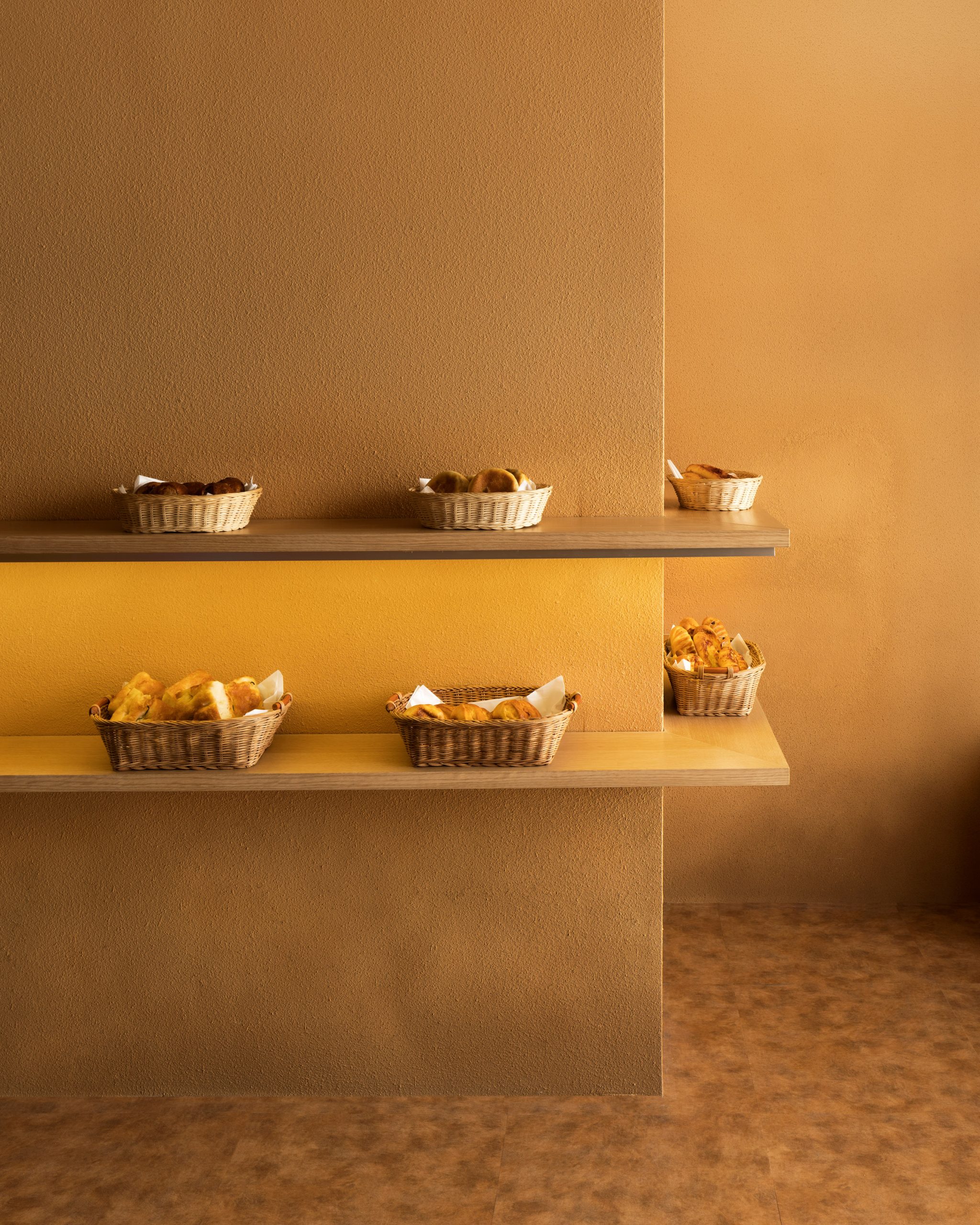Display shelves of Pinocchio tiny bakery in Japan by I IN